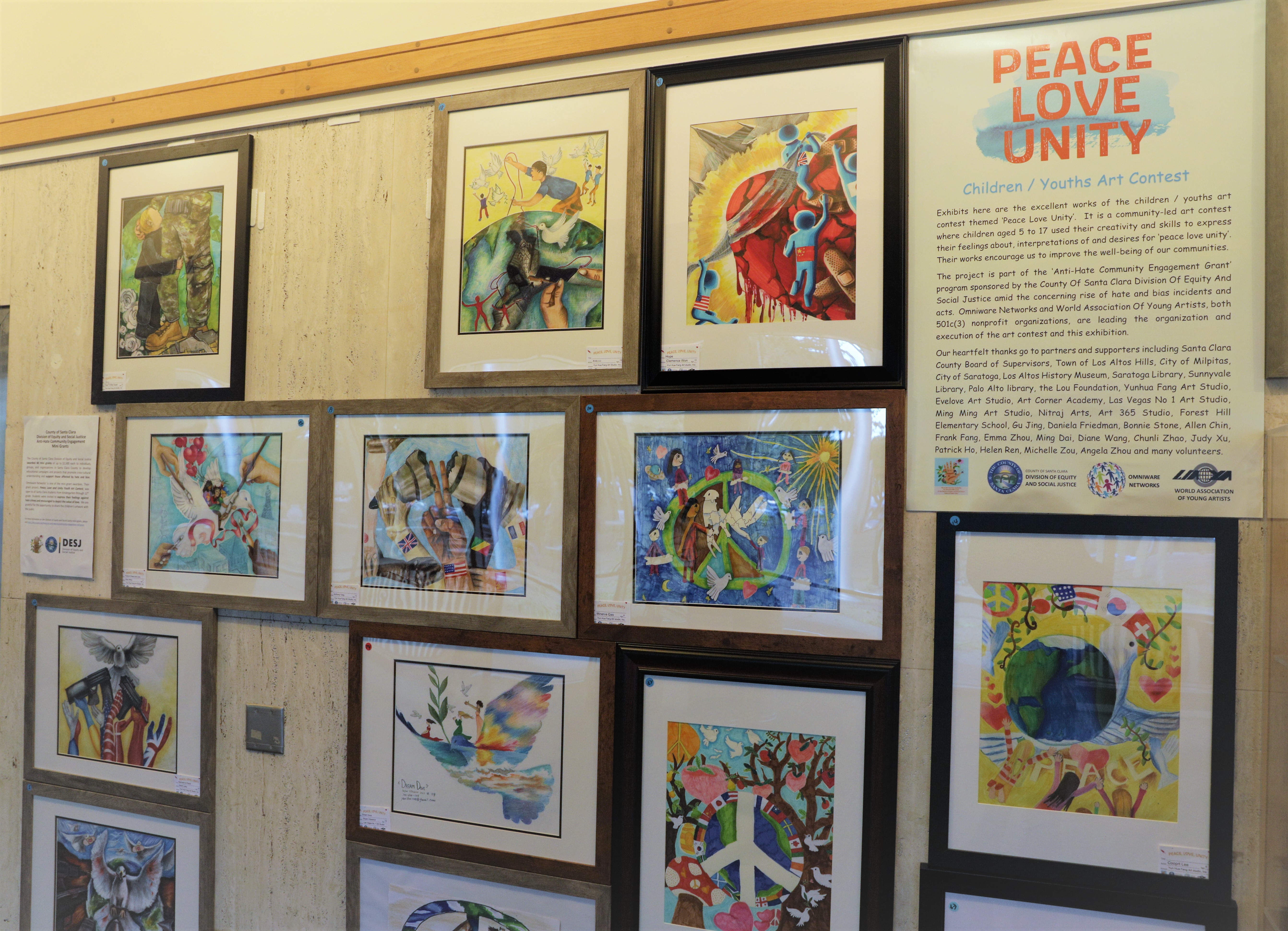 photos from the student art contest hanging in the breezeway of the County Administration Building