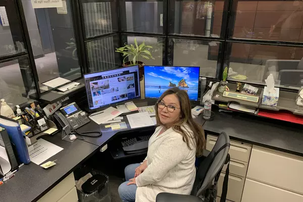 Diane Curiel at her desk in the reception area of the 11th floor at the County Administration Building at 70 W. Hedding St., San Jose.