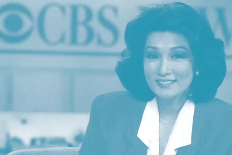 Connie Chung sitting at CBS news desk aapi month graphic