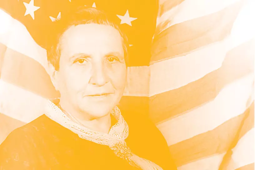 Gertrude Stein - standing in front of usa flag - pride graphic