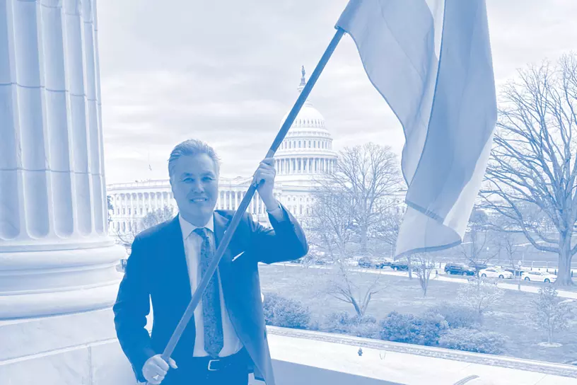 Mark Takano - hold trans flag at dc capitol - pride month graphic