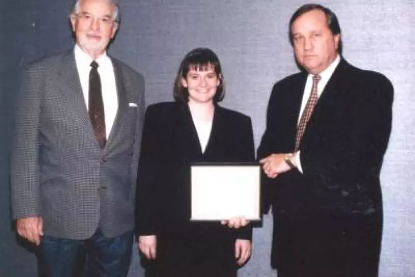 Erin West receiving the Robert L. Webb Award
