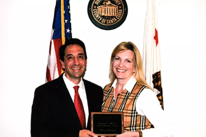 Terr Harman receiving the Napoleon J. Menard Award for Felony Trial Advocacy