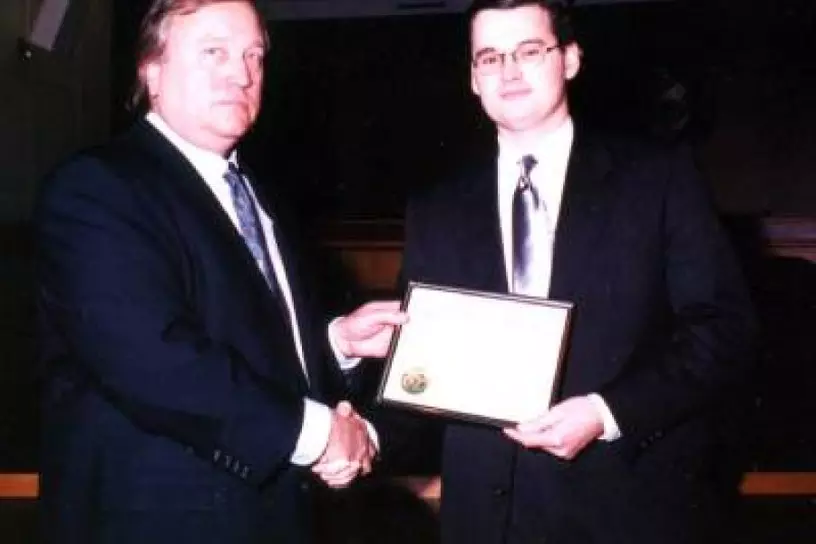 James Leonard receiving the Robert L. Webb Award