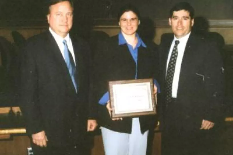 Deborah Medved receiving the Robert L. Webb Award