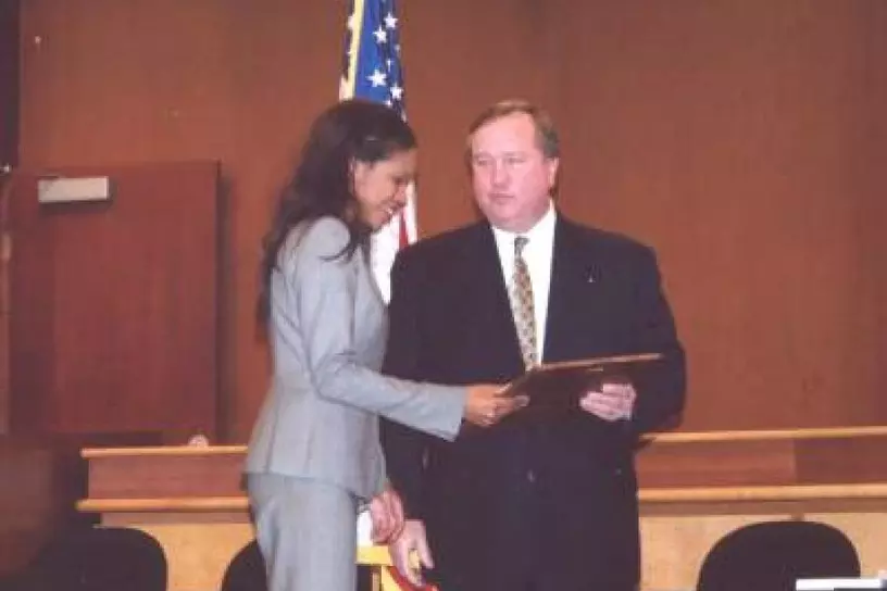 Leigh Frazier receiving the Robert L. Webb Award