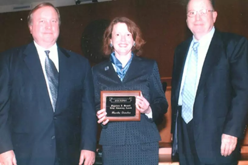 Martha Donohoe receiving the Napoleon J. Menard Award for Felony Trial Advocacy