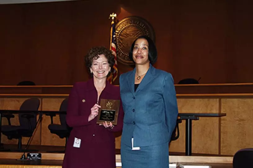 Valerie McGuire receiving the Napoleon J. Menard Award for Felony Trial Advocacy
