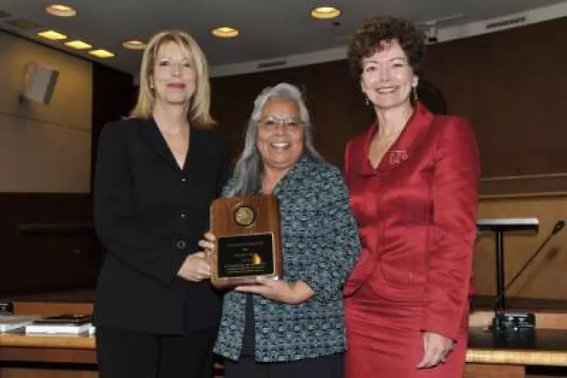 Virginia Rojo receiving the Legal Support Award of Excellence