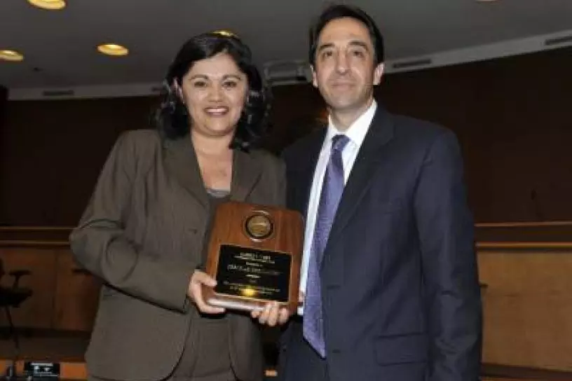 Deborah Hernandez receiving the Robert L. Webb Award