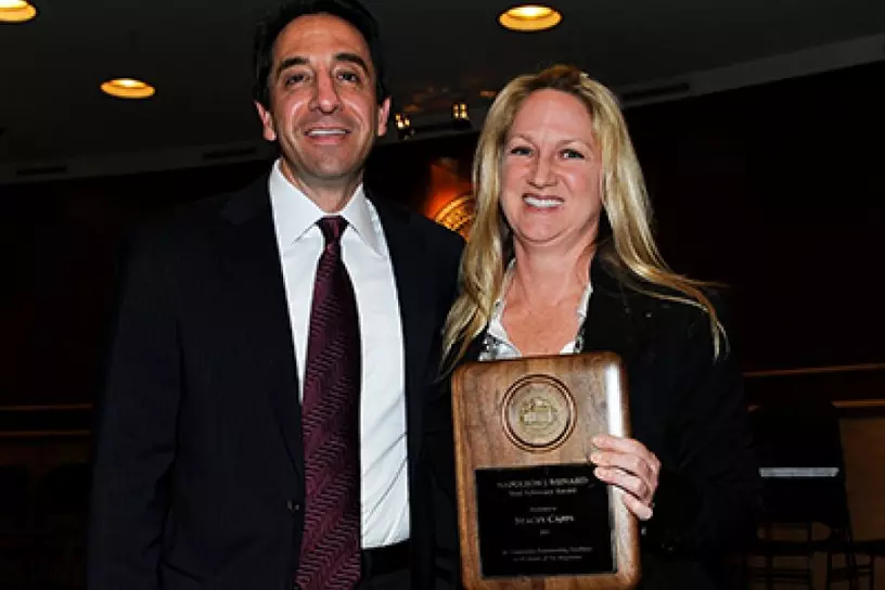 Stacey Capps receiving the Napoleon J. Menard Award for Felony Trial Advocacy