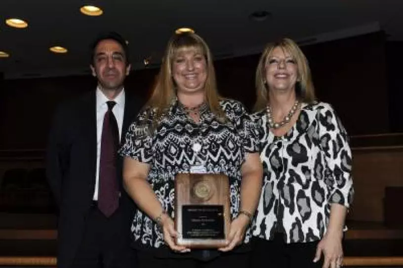Diana Tapolski receiving the Legal Support Award of Excellence