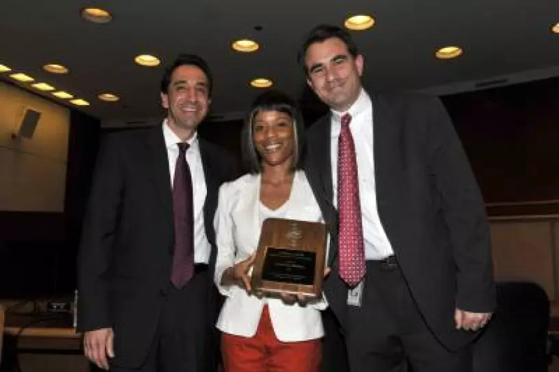 Tamalca Harris receiving the Robert L. Webb Award