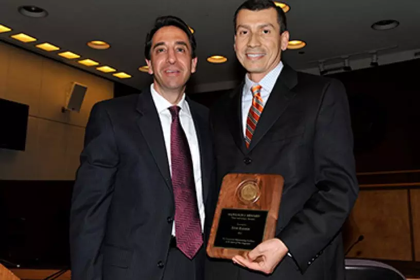 Luis Ramos receiving the Napoleon J. Menard Award for Felony Trial Advocacy