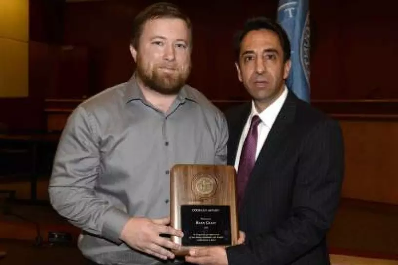 Ryan Glass receiving the Karyn Sinunu-Towery Courage Award