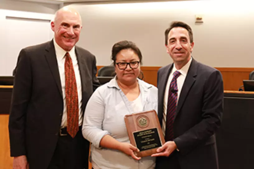 Celeste De Leon receiving the Legal Support Award of Excellence for Support Services