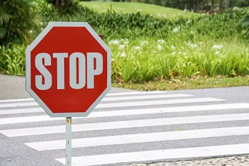 Stop sign with cross walk