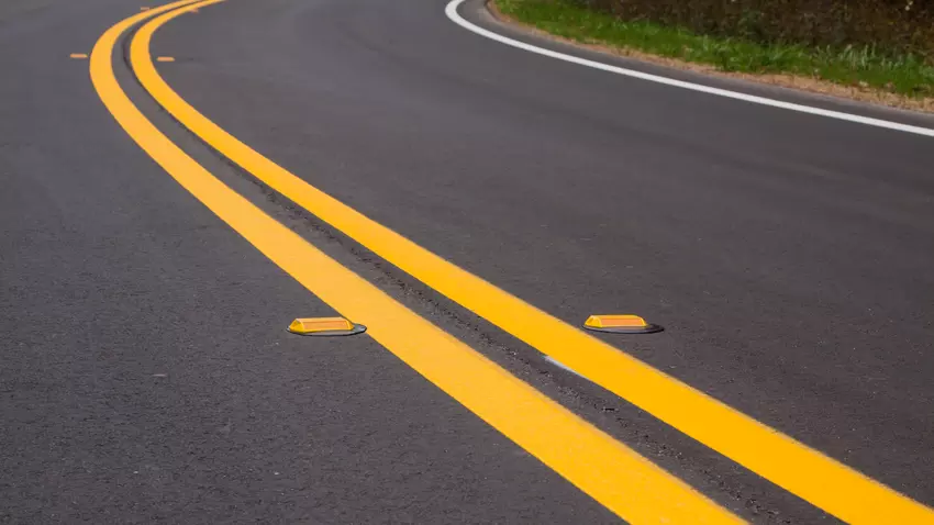 Roadway divider lines and markers