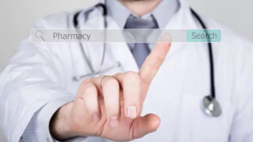 A doctor searching up "pharmacy" in search engine