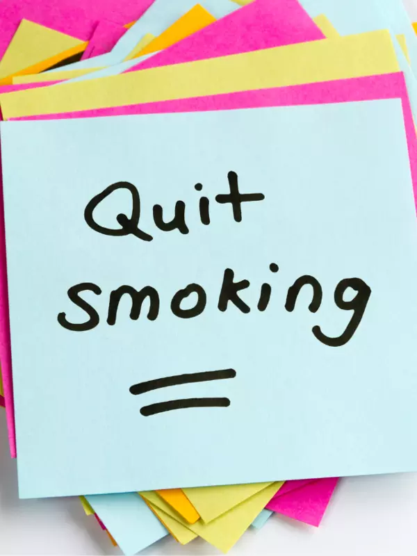 Quit smoking written on sticky note