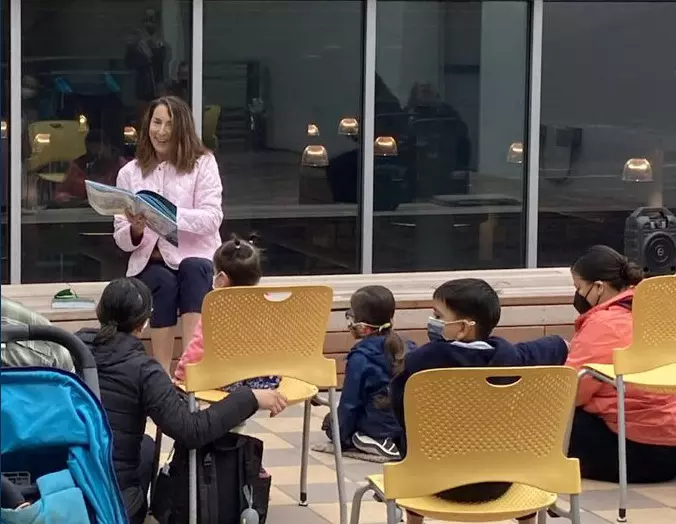 Supervisor Susan Ellenberg reads to children at Bascom Library.