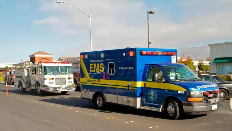 A County of Santa Clara Emergency Medical Services Ambulance on the street.