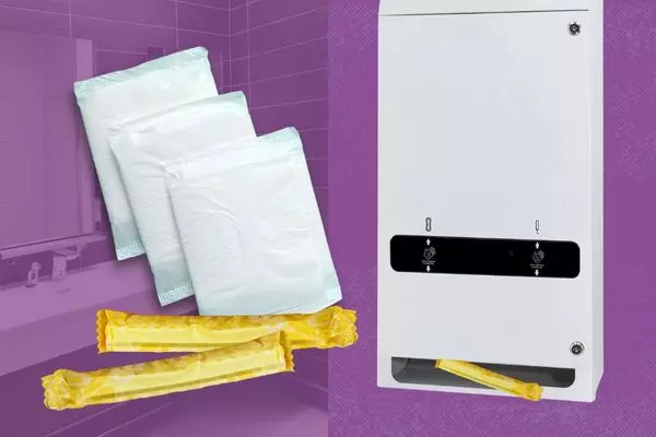 Menstrual pads and tampons in a restroom coming from a touch-free dispenser