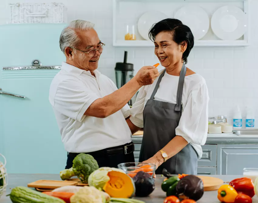 Older Asian Couple Eating Healthy